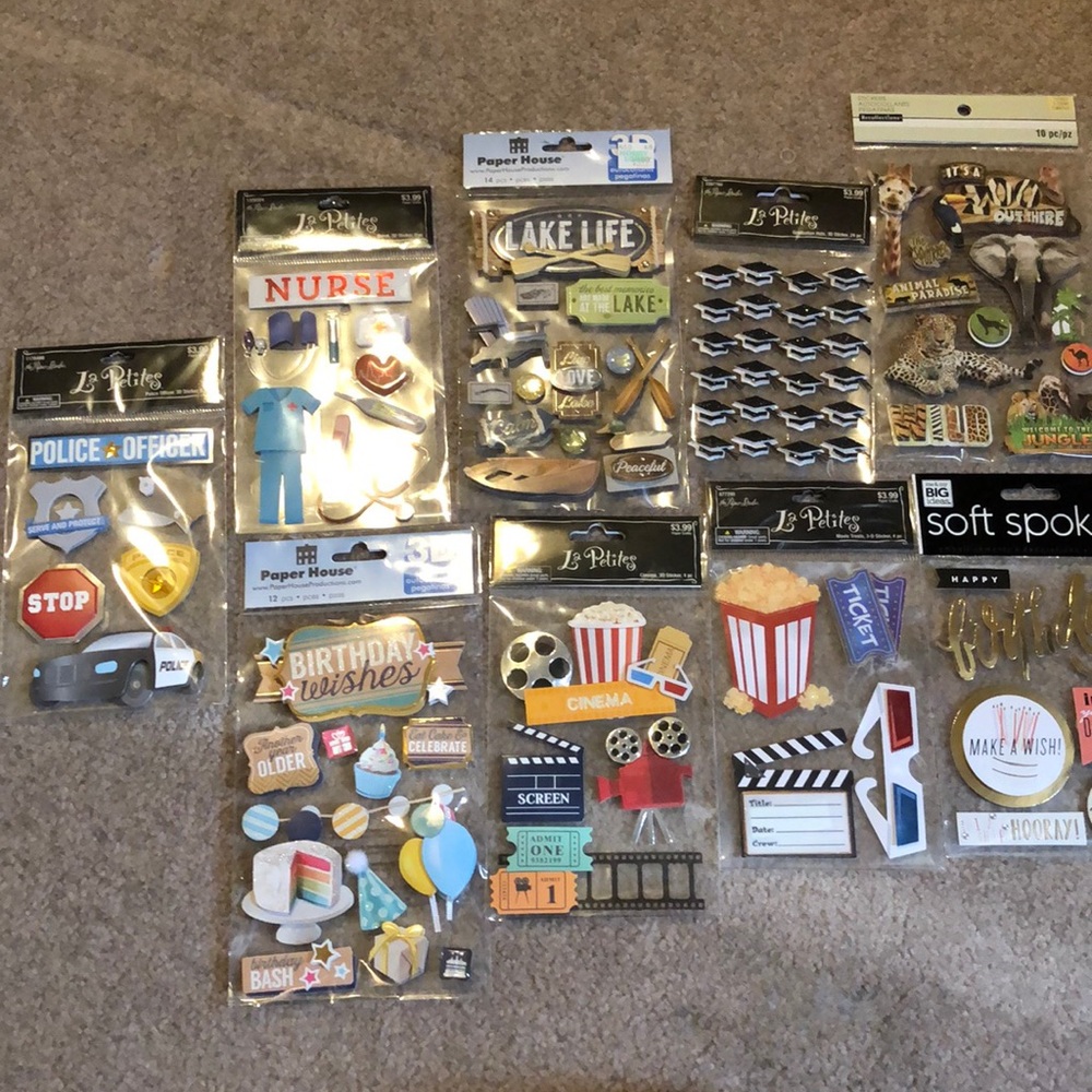 Scrapbook with 9 packages of stickers